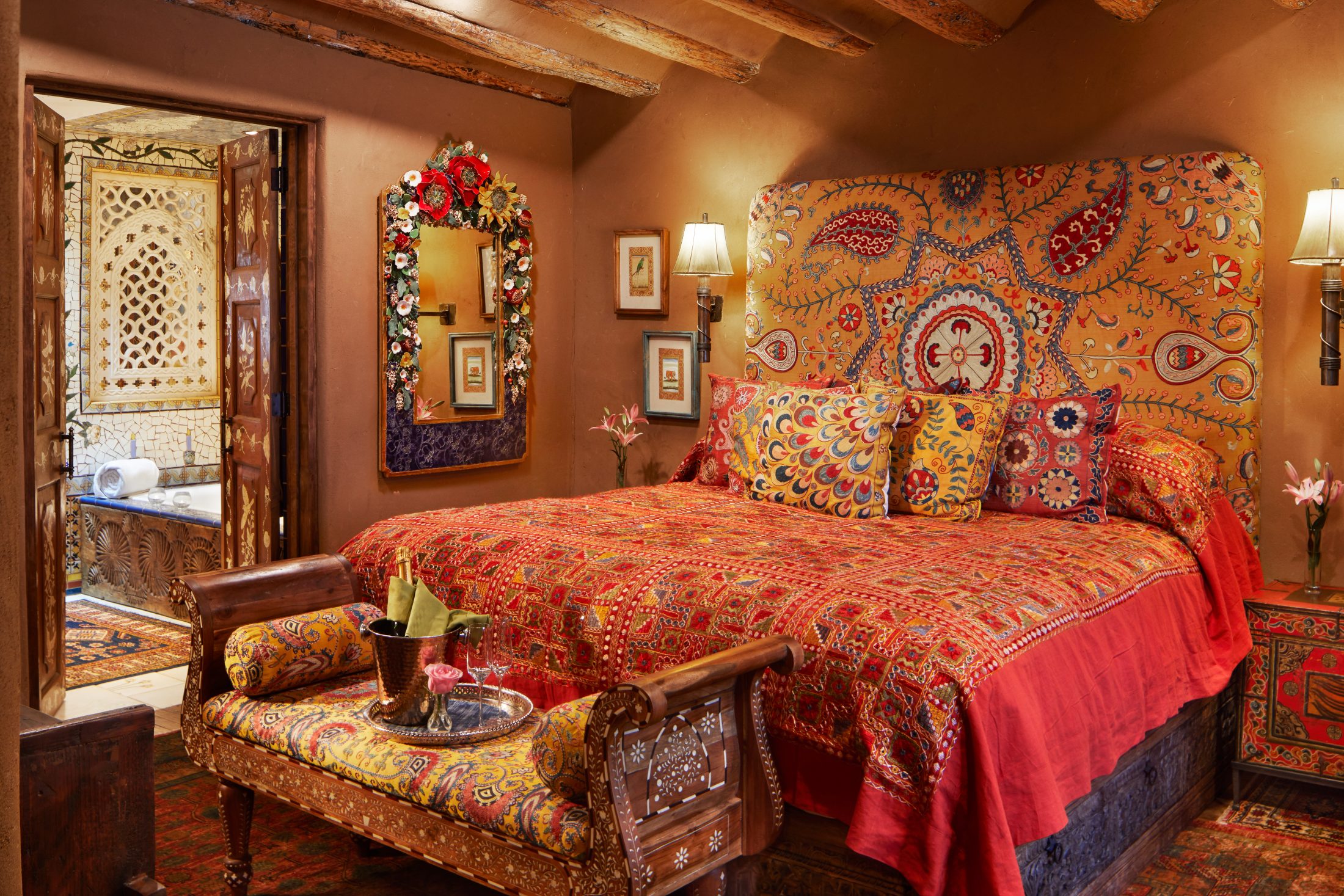 The bedroom in Juniper, one of our suites at The Inn of The Five Graces, a Luxury Boutique Hotel and resort in Downtown Santa Fe, New Mexico.