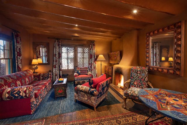 The living room in Lilium, one of our guestrooms at The Inn of The Five Graces, a luxury hotel and resort in downtown Santa Fe, New Mexico.