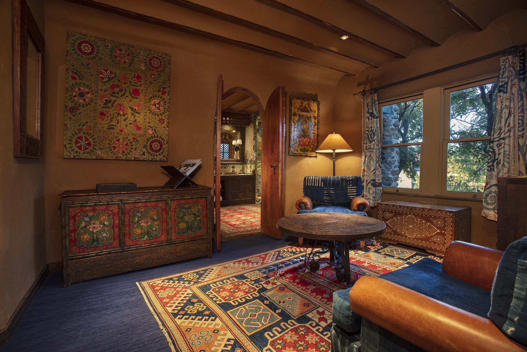 The living room in Citrine, one of our guest suites at The Inn of The Five Graces, a Luxury Boutique Hotel and resort in Downtown Santa Fe, New Mexico.